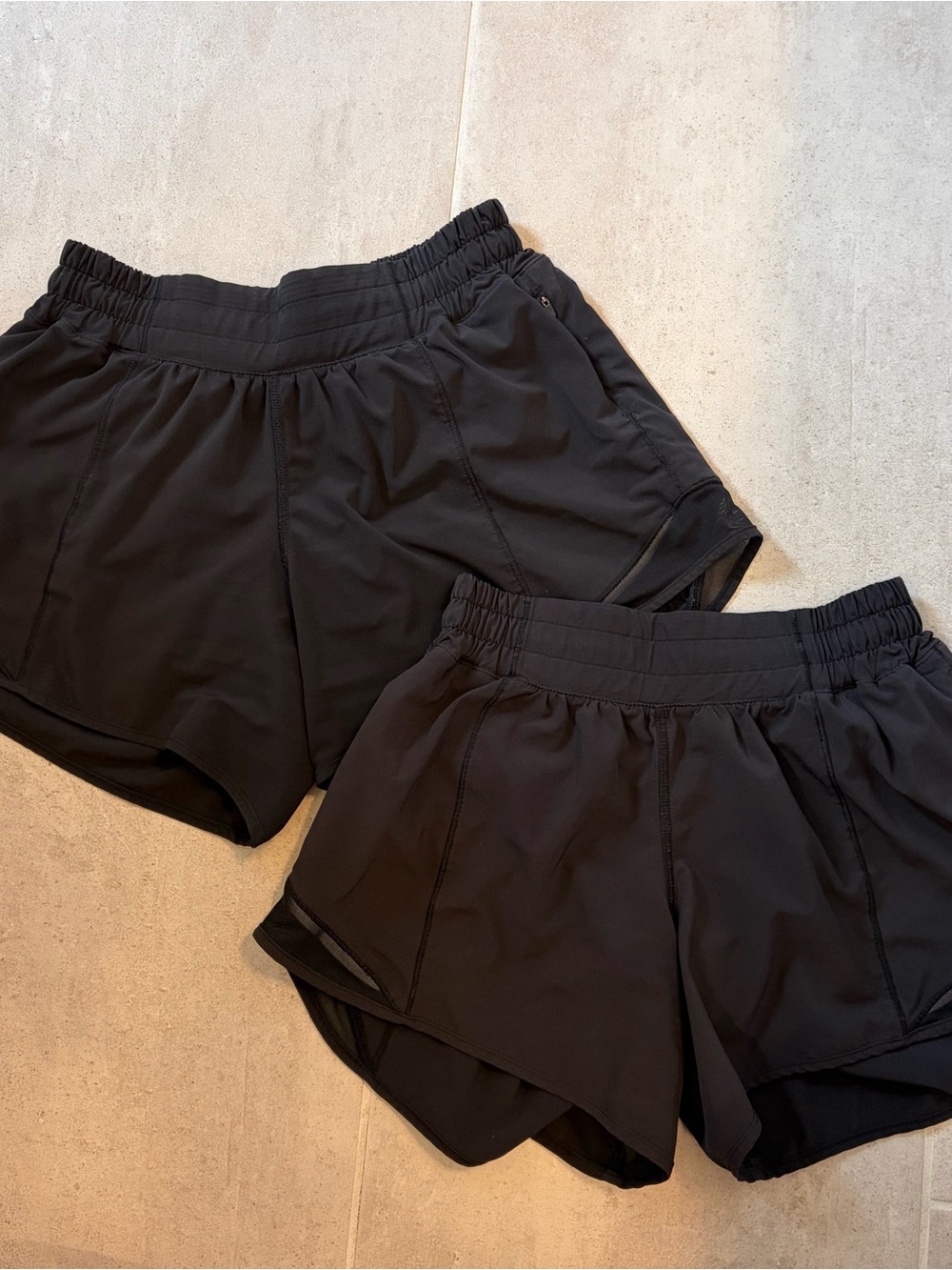 Lululemon Black Hotty Hot 4” low rise shorts — 2 PAIRS